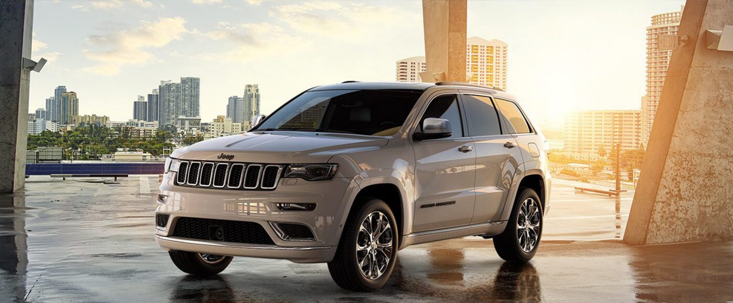 The 2021 Jeep Grand Cherokee Overland being driven on a mountain road.